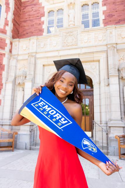 Student with graduation stoll and cap 