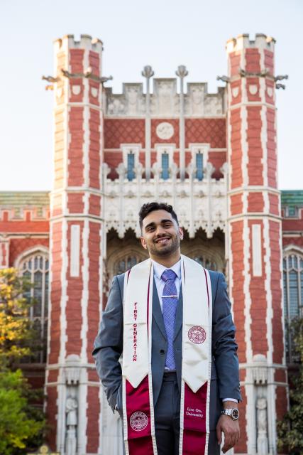 Student with graduation stoll and cap 